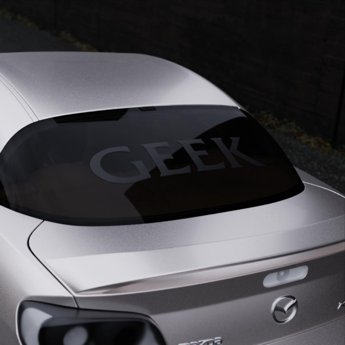 geek banner — black variant, car banner on the rear window, three-quarter view