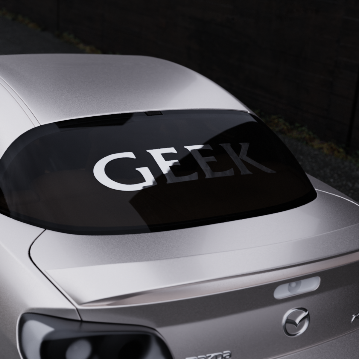 geek banner — chrome variant, car banner on the rear window, three-quarter view