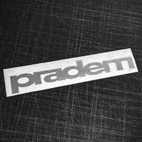 white sticker with a grey pradem logo